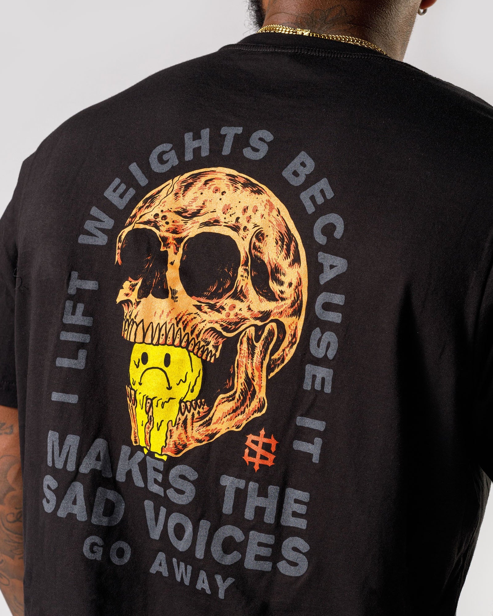 Weightlifting Skull T-Shirt — "I Lift Weights Because It Makes The Sad Voices Go Away"