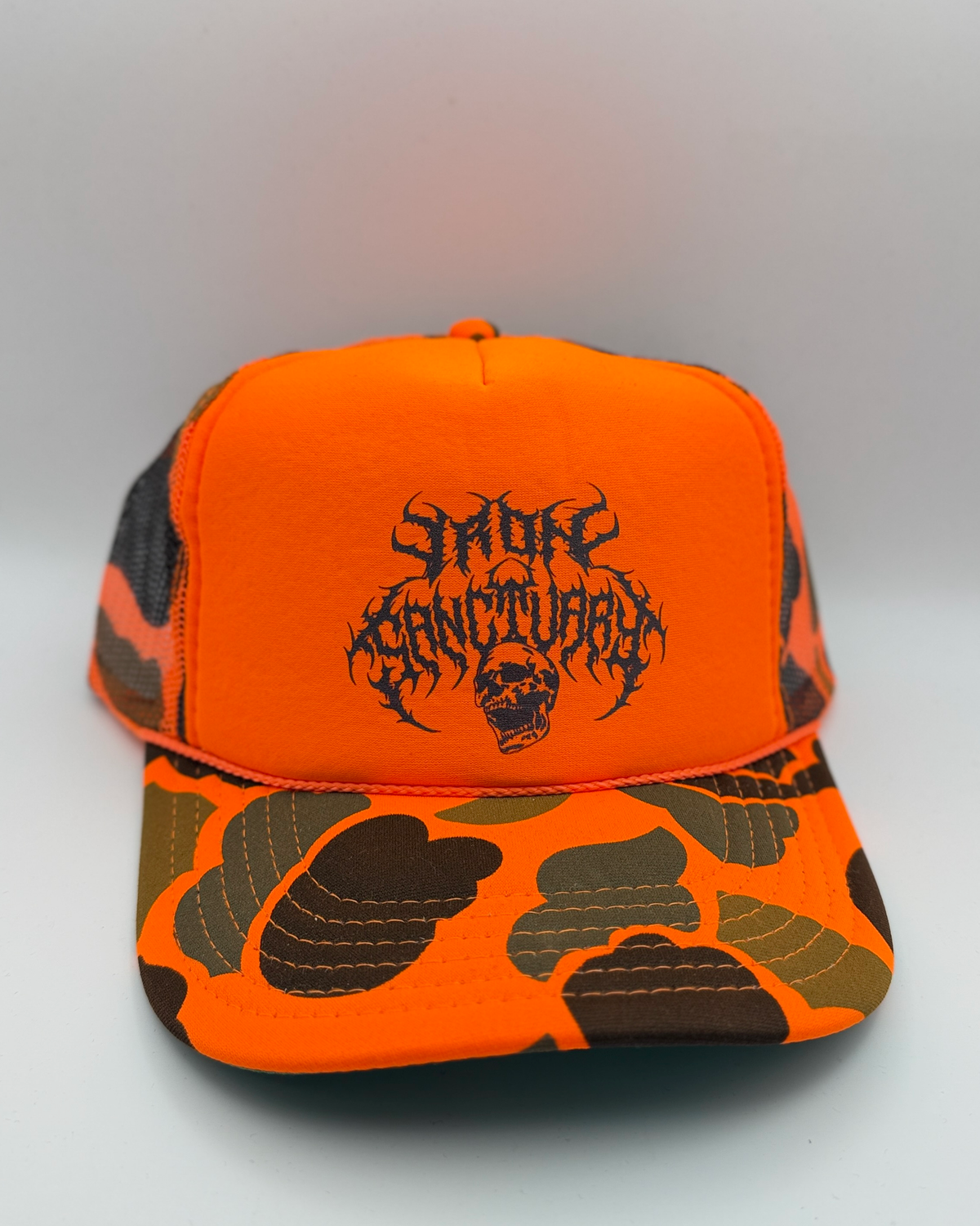 Metal orange camouflage trucker hat, front view