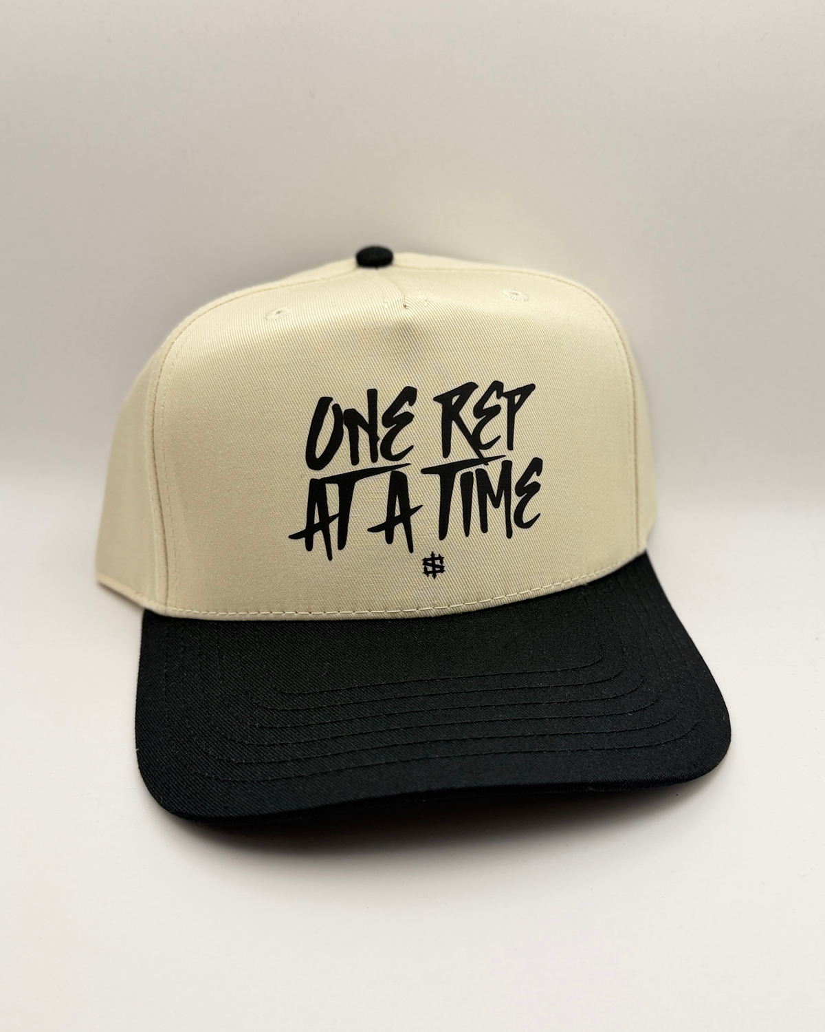 One Rep at a Time Snapback - Tan / Black, front view